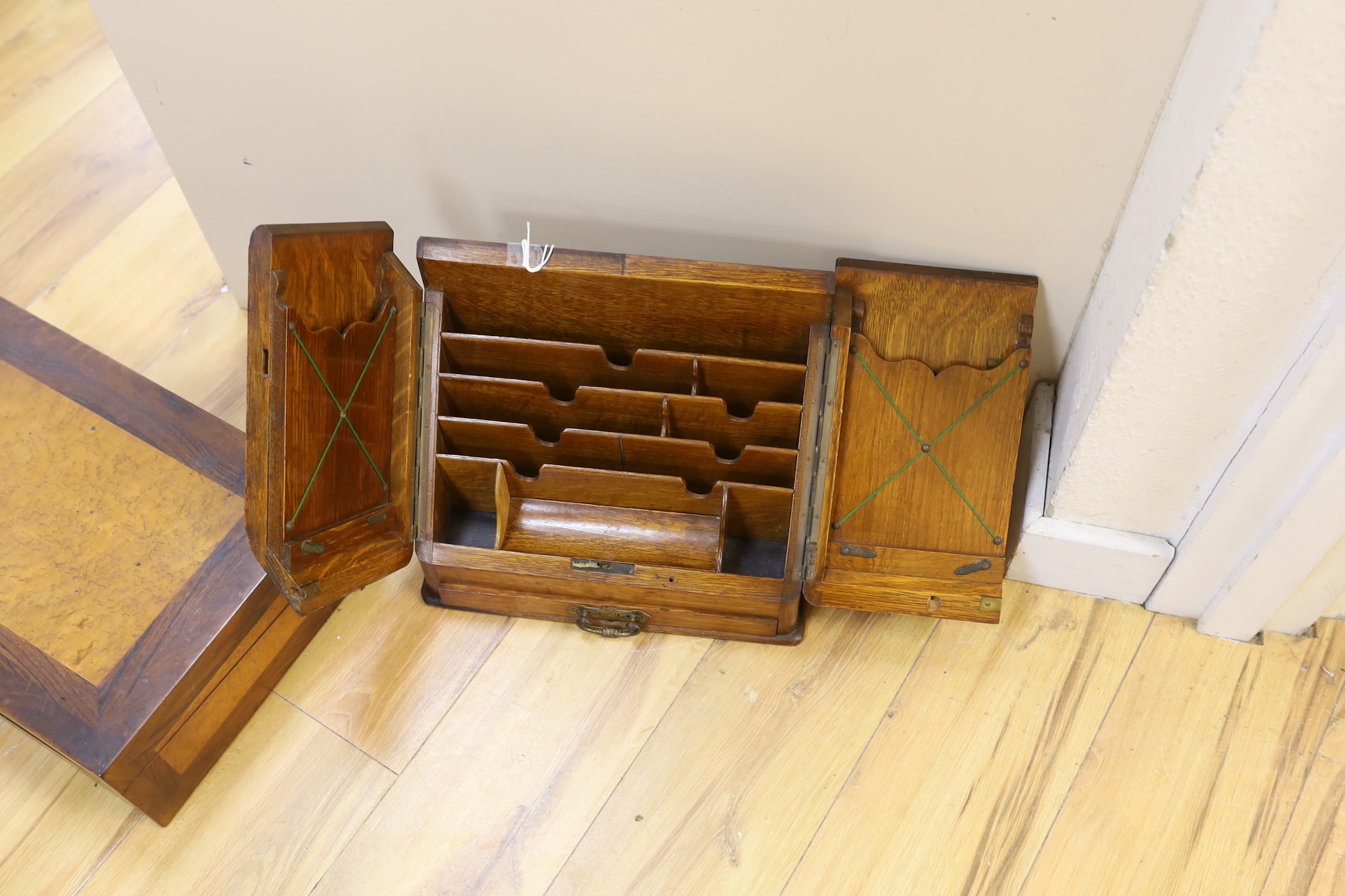 A Victorian birds eye maple and rosewood writing slope, 44.5 cms wide x 14 cms high.